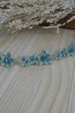 Tiara Flores Azul